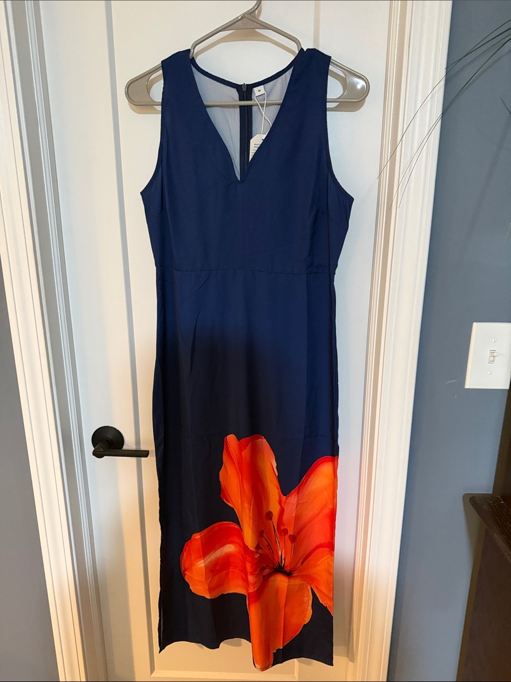 Sleeveless Navy Maxi Dress with Bold Orange Floral Print